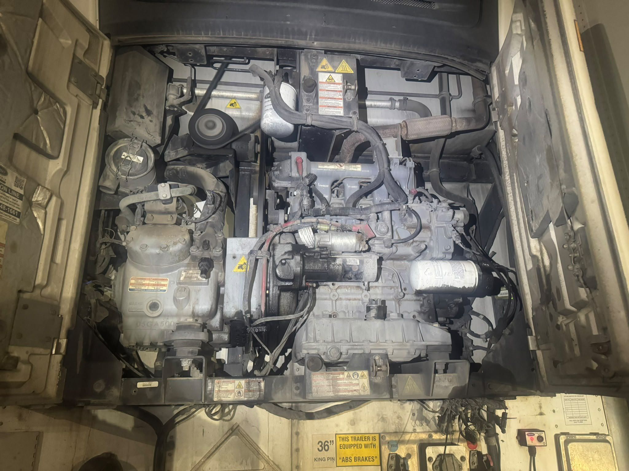 Reefer unit engine bay opened up for service