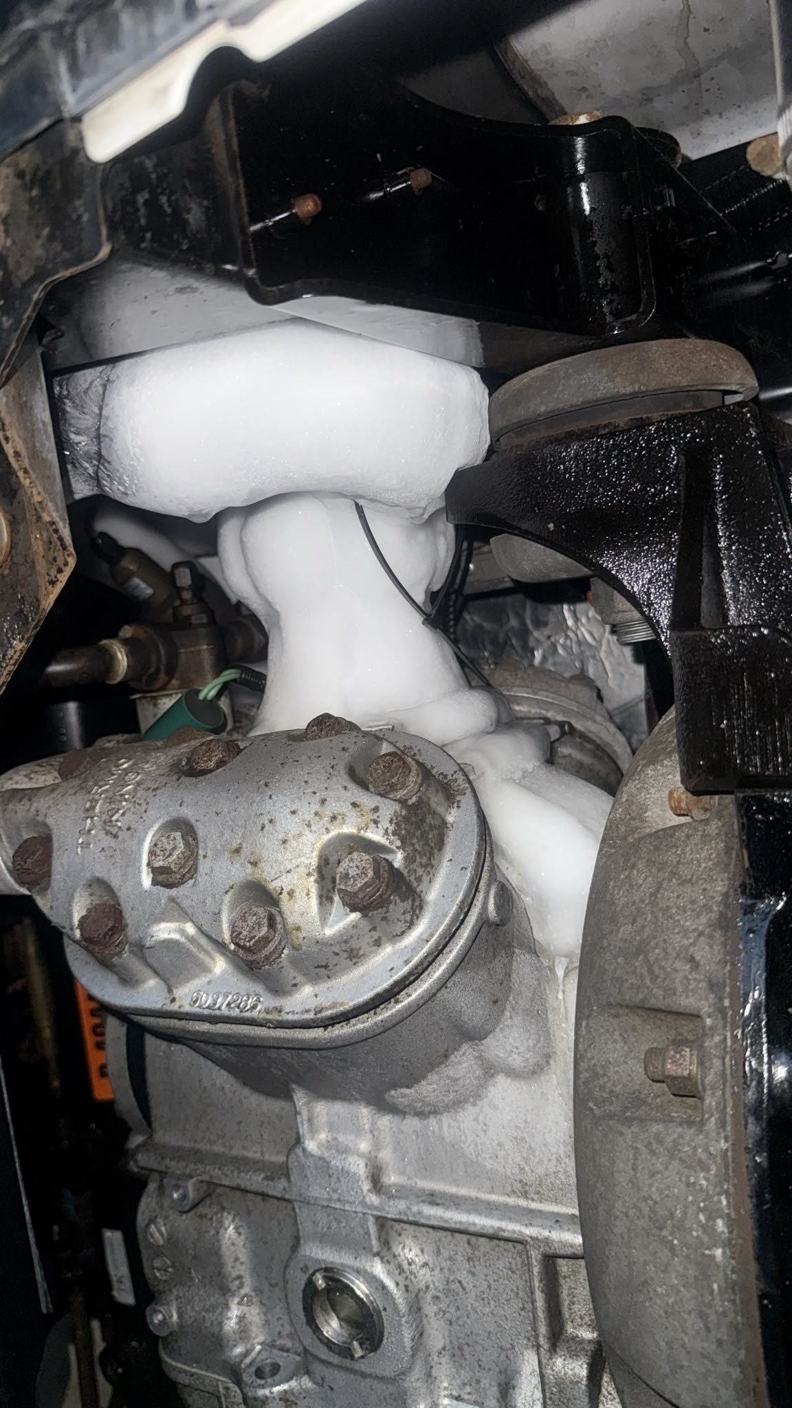 Reefer compressor covered in frost
